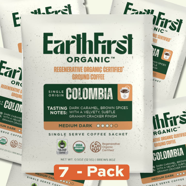 Seven EarthFirst Organic regenerative organic certified medium-dark coffee single sachets arranged in a pack.