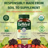 EarthFirst Organic Women's Multi Once Daily, USDA and CCOF Organic, GMP certified, surrounded by fresh vegetables.